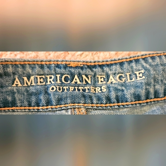 American Eagle Distressed Lightwash Jeans | Large Leg Holes - Picture 4 of 9